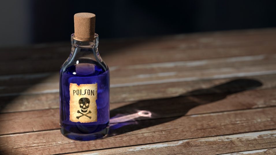 Small blue bottle of poison
